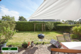 Terrasse mit Blick in den Garten - Idyllisches Familiennest mit guter Energieeffizienz