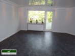 Wohnzimmer - Kernsanierte ETW in gepflegtem 8-Parteien-Haus mit Garage